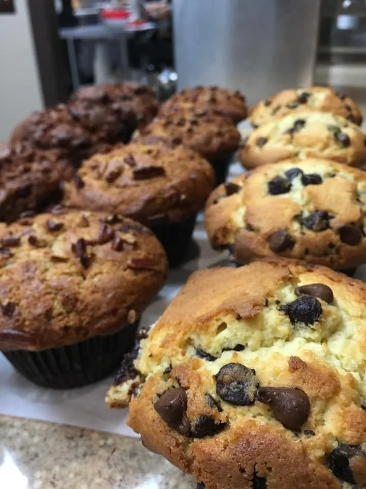 Chocolate chip muffins in the case
